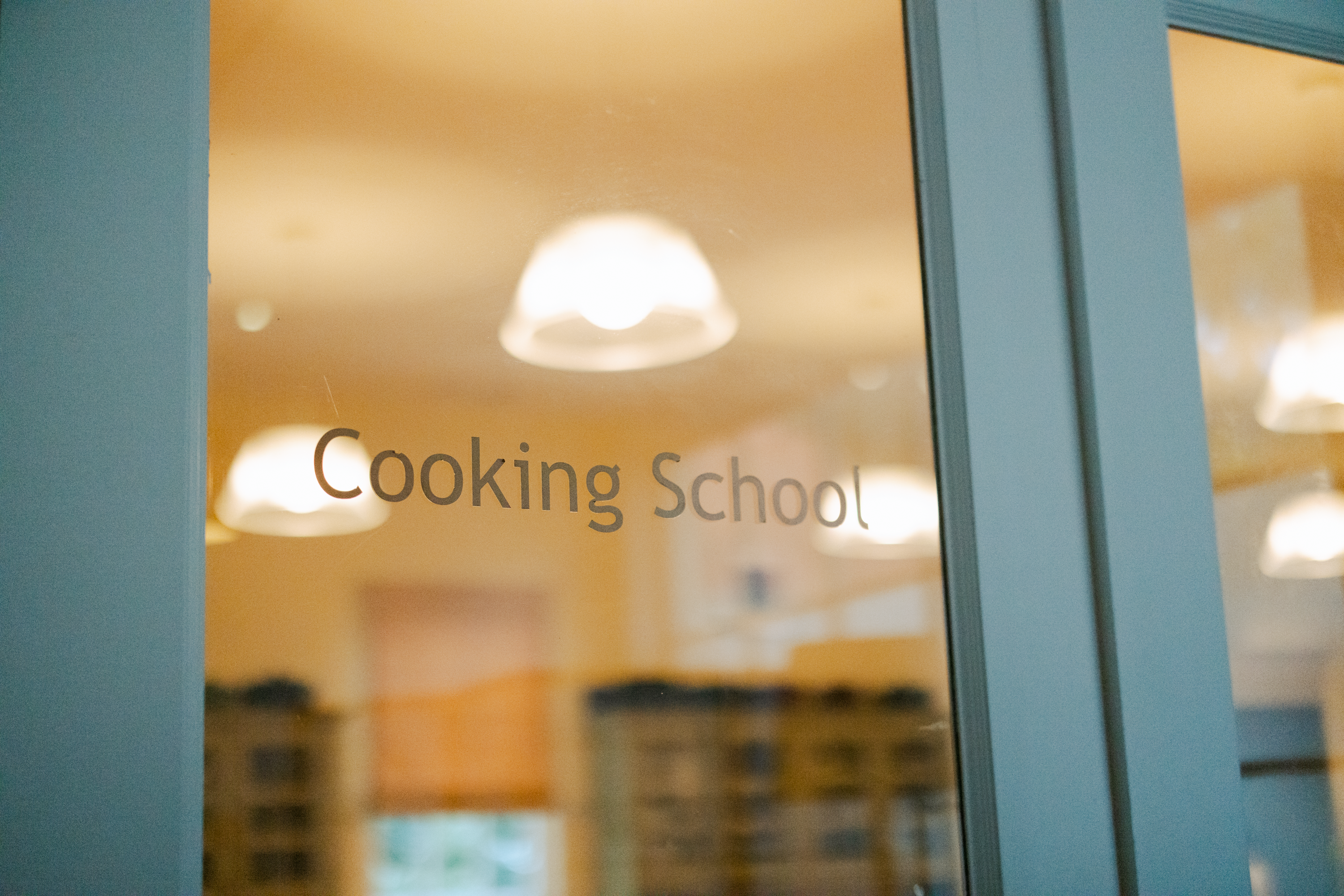 Cooking school sign on door