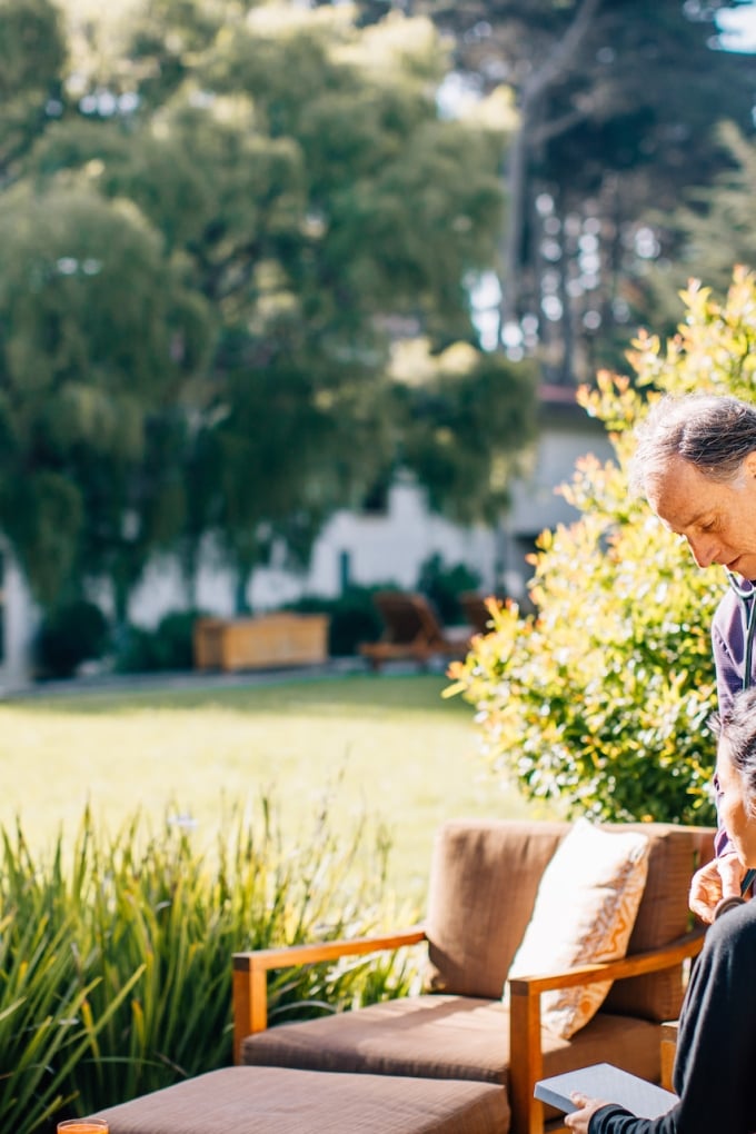 Doctor with patient outdoors