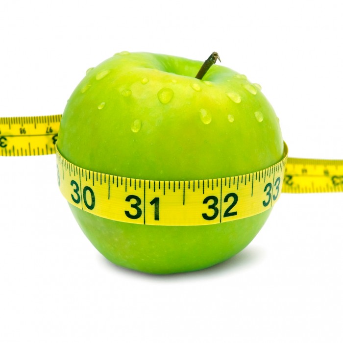 apple with measuring tape