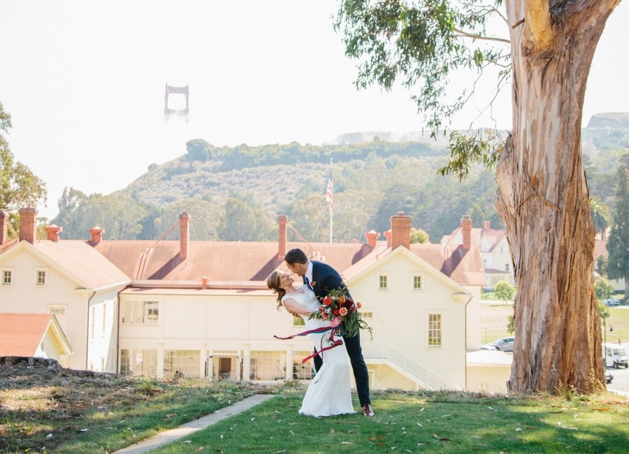 wedding couple kissing outdoors