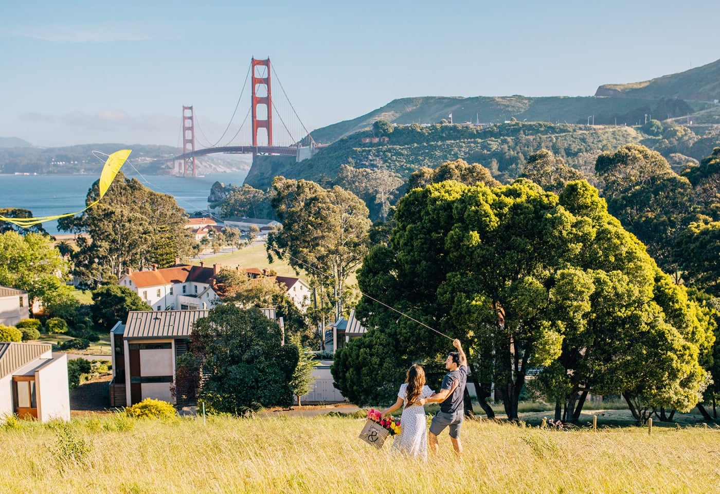people flying a kite in the hills above cavallo point