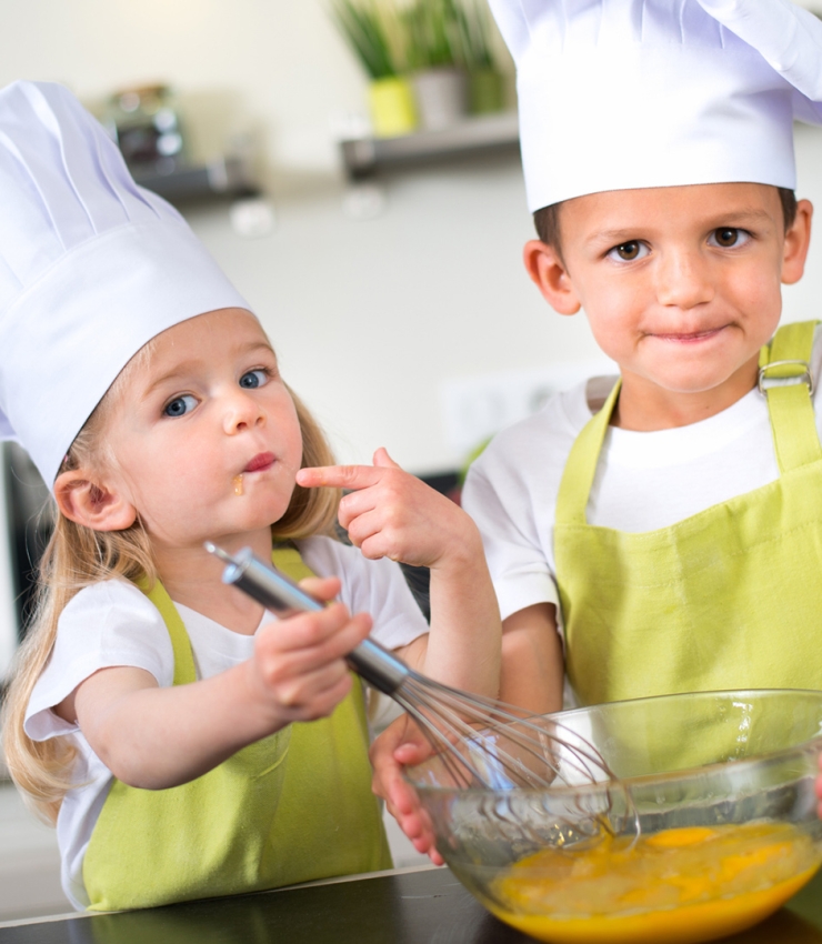 kids cooking eggs