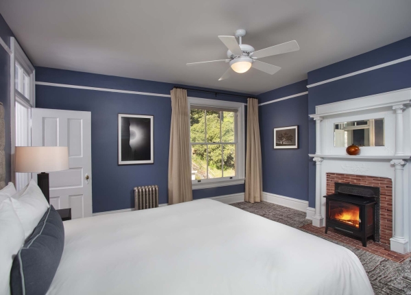 Historic bedroom with King bed and fireplace