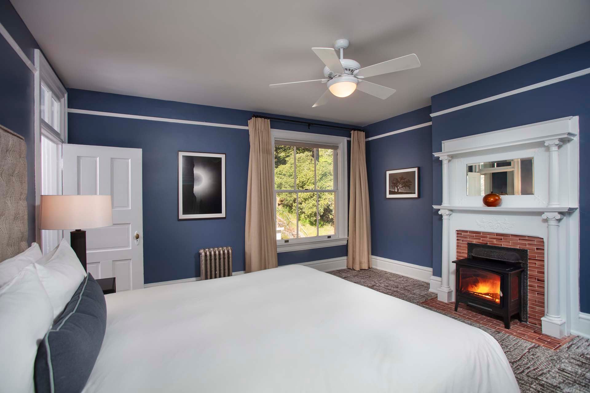 Historic bedroom with King bed and fireplace