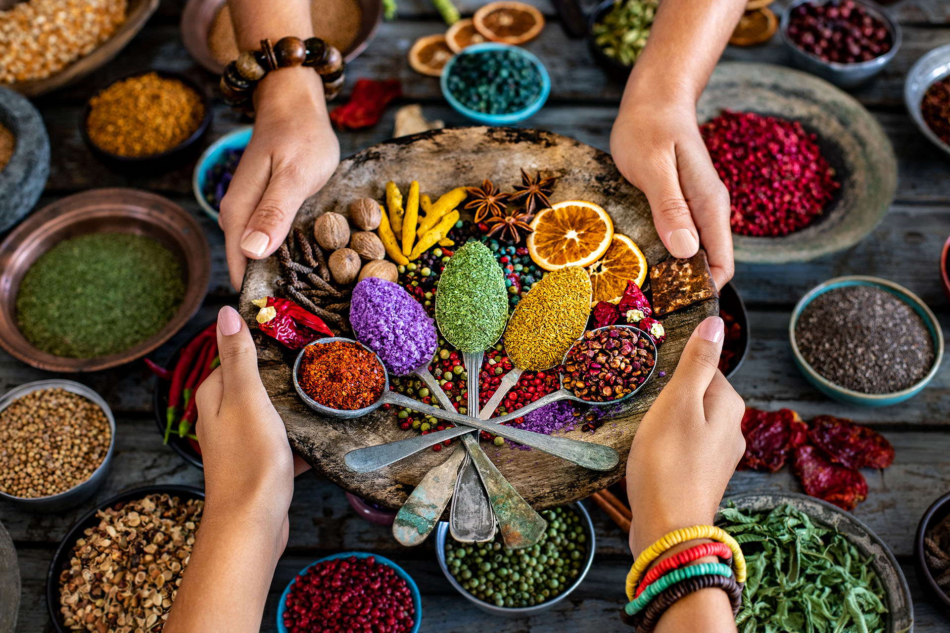 hands holding turkish dishes